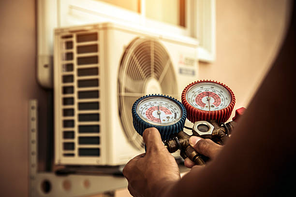 Professional Air Conditioning Service technician working in Kinney, MN